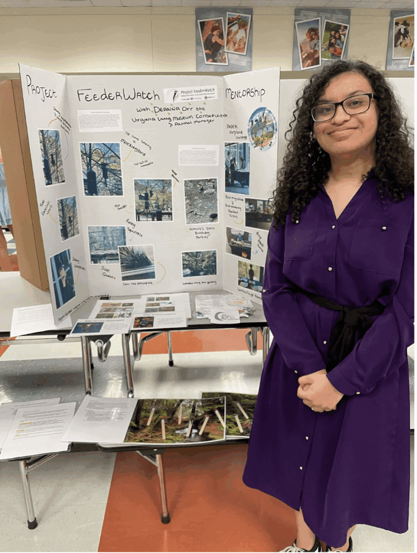 Aysia Forbes shared her work with classmates, teachers, parents, and community members at a symposium